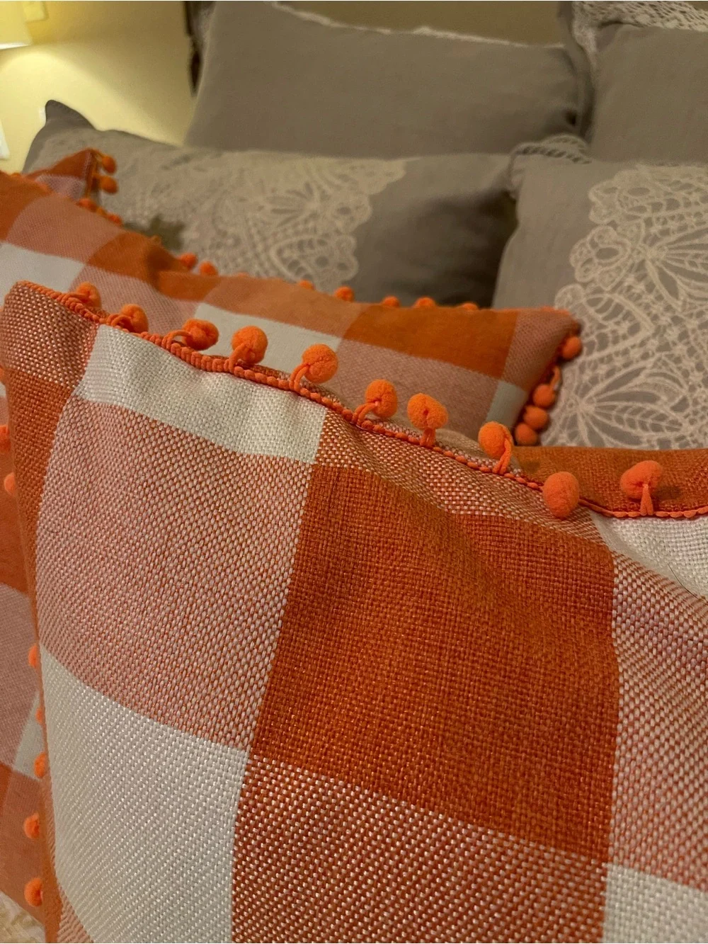 Orange Buffalo Check Decorative Throw Pillows with Pom Trim (x 4)
